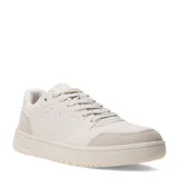 Championes urbanos color beige con detalles en cuero sintético y suela de goma.