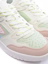 Championes Umbro modelo Shoots Lady, de estilo deportivo urbano, con combinaciones de colores pastel: blanco, rosa pálido, celeste y verde menta. Presentan el logo Umbro en el lateral.