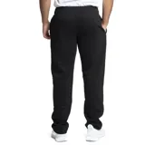 Pantalón de jogging negro de felpa, con cintura elástica, cordón ajustable y logo de Umbro estampado en blanco en la pierna izquierda.