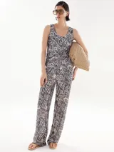 Pantalón de lentejuelas con estampado de leopardo, de corte amplio y cómodo.