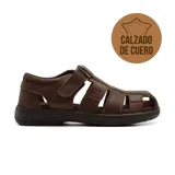 Sandalia de cuero marrón con múltiples tiras y ajuste con velcro.