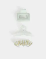 Set de accesorios para el pelo que incluye dos broches y una hebilla francesa con forma de caracolas de mar.