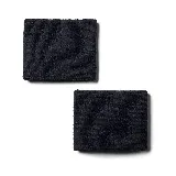 Par de muñequeras deportivas Under Armour negras con logo blanco bordado.
