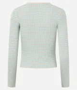 Cardigan de punto acanalado color bordó de la marca Blue Steel, con cuello redondo y cierre frontal de cremallera doble. Posee un calce ajustado, largo corto y mangas largas.