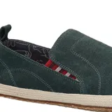 Alpargata azul marino de cuero con forro textil y plantilla de cuero. Suela de goma con construcción de yute.