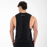 Musculosa unisex negra de algodón, con estampado serigráfico en el frente con la palabra "GAINS." y en la espalda con la palabra "PERSISTENCE".