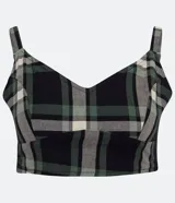 Top corto de tricolina con estampado de cuadros en tonos negro, verde y blanco. Tiene tirantes finos ajustables y elástico en la espalda.
