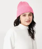 Buzo cropped blanco de algodón con cuello alto y puños acanalados.