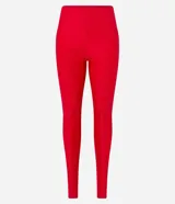 Calza legging deportiva roja de poliamida y elastano, con cintura alta, recortes y bolsillo lateral.