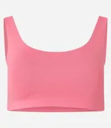 Top deportivo blanco de poliamida, sin copa, sin estampa y con escote redondo.