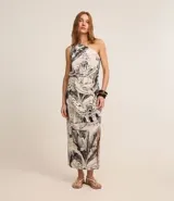 Pollera midi de viscosa y lino color crudo, con estampado de paisajes modernistas, nudo lateral y corte al bies.