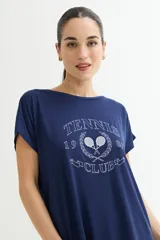 Vestido corto color verde oliva con estampado de dos rostros en color blanco.