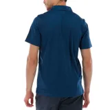 Polo de hombre Columbia Tech Trail, color blanco, de manga corta, con logo bordado en el pecho. Confeccionada en tejido hidroabsorbente Omni-Wick™ con elastano.