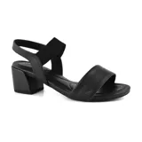 Sandalias de cuero negro con taco bajo y pulsera elástica en el tobillo.