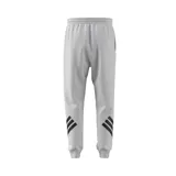 Pantalón de jogging gris con cintura ajustable y logo de Adidas en la pierna izquierda. Presenta tres tiras negras en la parte inferior de ambas piernas.