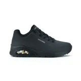 Zapatillas Skechers Street Uno - Stand on Air, color negro. Capellada sintética con textura de cuero liso, cordones, perforaciones y costuras de adorno. Plantilla SKECHERS Air Cooled Memory Foam y media suela con cámara de aire visible.