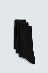 Pack de tres pares de calcetines negros de punto elástico con terminación acanalada.
