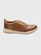 Championes urbanos Hush Puppies modelo Draper, color azul marino, confeccionados en cuero, con cordones grises, plantilla Smart Foam® y suela de goma color beige.