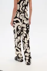 Pantalón de viscosa con estampado abstracto en blanco y negro, de corte ancho y tiro alto.