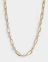 Collar corto bañado en oro con cadena de eslabones alargados y strass.