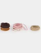 Set de gomitas elásticas básicas para el pelo en colores marrón, beige, rosa y blanco.