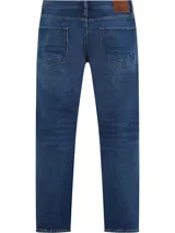 Jeans rectos de corte regular, con cierre de botón y cremallera, detalles distintivos de Tommy Hilfiger y parche con logo en la parte posterior.