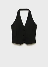 Chaleco negro con cuello halter, espalda descubierta y cierre frontal con botones.