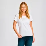 Remera blanca de manga corta con logo metálico de CAT en el pecho.
