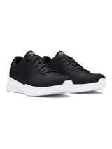 Championes Under Armour Edge Lthr, color negro con suela blanca. Diseñados para entrenamiento en gimnasio y al aire libre.