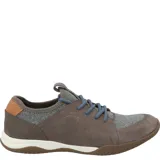 Championes Hush Puppies modelo Space, color celeste con detalles en marrón y suela marrón. Capellada de cuero con cuello de lycra y planta con tecnología GreenFoam® en base a caña de azúcar.