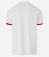 Remera de algodón color crema con cuello redondo y mangas cortas con ribete rojo. Estampa frontal con el logo de Kodak.