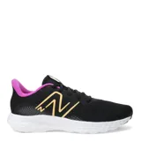 Championes de mujer ligeros con diseño negro y detalles en rosa, ideales para comodidad y rendimiento.