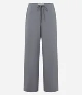 Pantalón largo de rib color crudo, con cintura elástica y cordón de ajuste.