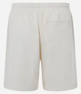 Bermuda color crema de algodón y lino, con cintura elástica ajustable con cordón, bolsillos laterales y textura.