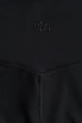Calza de yoga negra de tiro alto, confeccionada en tejido funcional SoftMove™ con tecnología Lycra® Sport y DryMove™.
