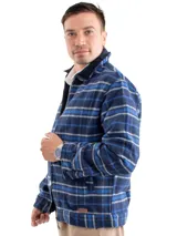 Campera tartan de lana con cierre frontal, diseño a cuadros en tonos verde y tostado.