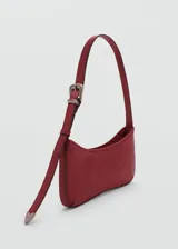 Bolso marrón con estampado floral, asa de hombro ajustable y cierre magnético.