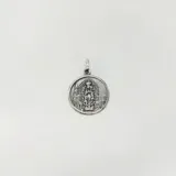 Dije redondo de plata 925 con la imagen de la Virgen de Guadalupe en relieve.