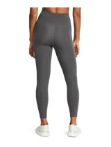 Calza deportiva Under Armour Motion Ankle Leg color azul con pretina alta, logo estampado en la cadera y bolsillo lateral.