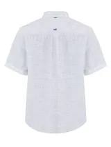 Camisa de manga corta blanca con textura multicolor, confeccionada en lino orgánico y tencel. Tiene bolsillo en el pecho con botón.