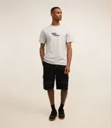 Remera gris de algodón con estampa en la espalda de Miles Morales, el Spider-Man del universo Marvel.