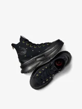 Championes Converse Run Star Legacy CX HI, color negro con detalles dorados. Diseño de caña alta con plataforma y tachuelas doradas.