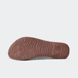 Ojotas Reef Cushion Slim color marrón con plantilla acolchada y tira delgada.