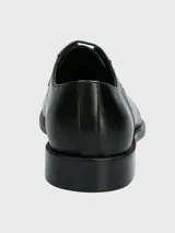 Zapato de vestir Hush Puppies Jazz, color marrón, de cuero, con cordones y suela de goma.