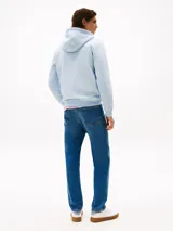 Buzo con capucha Tommy Hilfiger celeste con logo bordado en el pecho y cordones blancos.