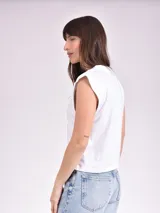 Remera color rosa con estampado de palmeras y texto "Sur la Cote D'Azur France Saint Jean Cap Ferrat".