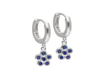 Aros tipo argolla de plata 925 con dije colgante de flor con circonias azules.