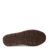 Zapato acordonado de cuero color marrón con detalles en gamuza en el talón. Suela de goma color beige y marrón.