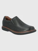 Zapato slip on de cuero negro con suela de goma EVA y plantilla de cuero y algodón orgánico.