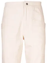Pantalón de pierna recta color ladrillo, tiro alto y bolsillos estilo carpintero. Confeccionado en algodón orgánico.